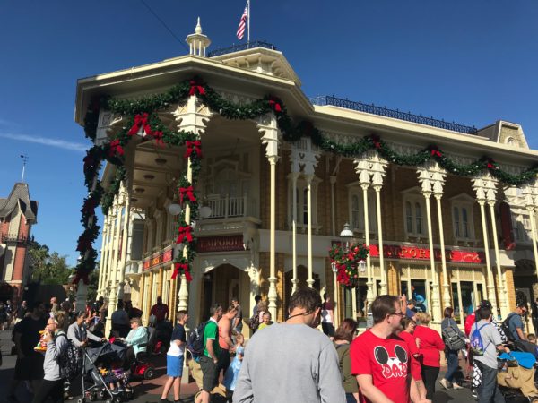The Emporium is beautifully decorated with green pine and red ribbons!
