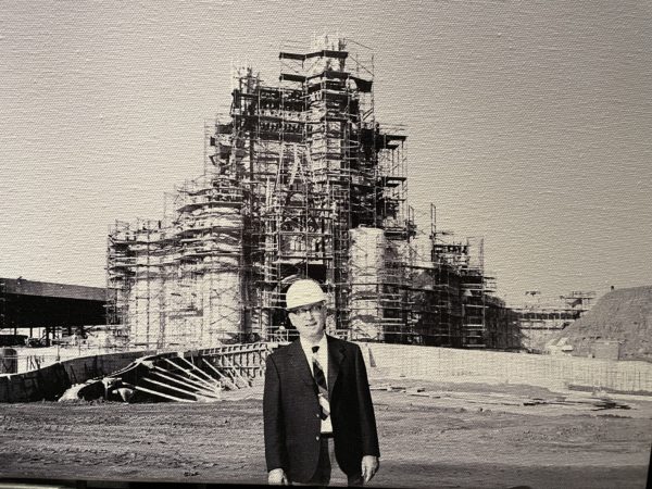 Walt Disney's brother and company co-founder Roy O. Disney poses in front of the under-construction Cinderella Castle. Photo credits (C) Disney Enterprises, Inc. All Rights Reserved 