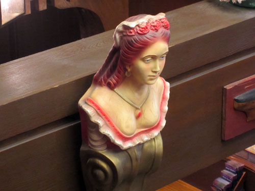 Ship figurehead carving in the ordering area.