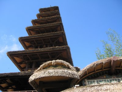 The Enchanted Tiki Room is easy to spot in Adventureland - just look for the huge tower.