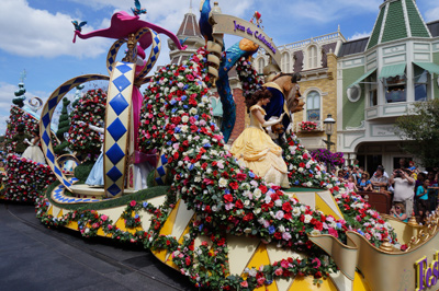 Plenty of flowers surround Belle and the Beast.