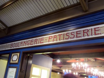 Entrance sign over the ordering area of the bakery.