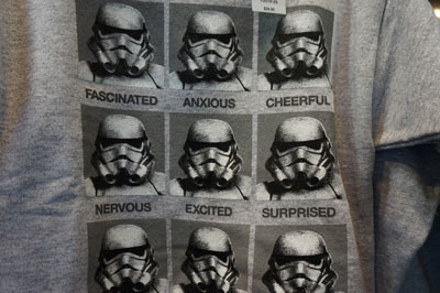 Fun Star Wars merchandise like this Storm Trooper expression shirt.